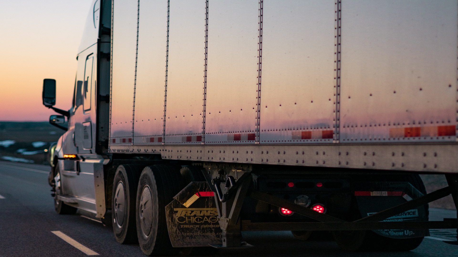 tractor trailer at dusk
